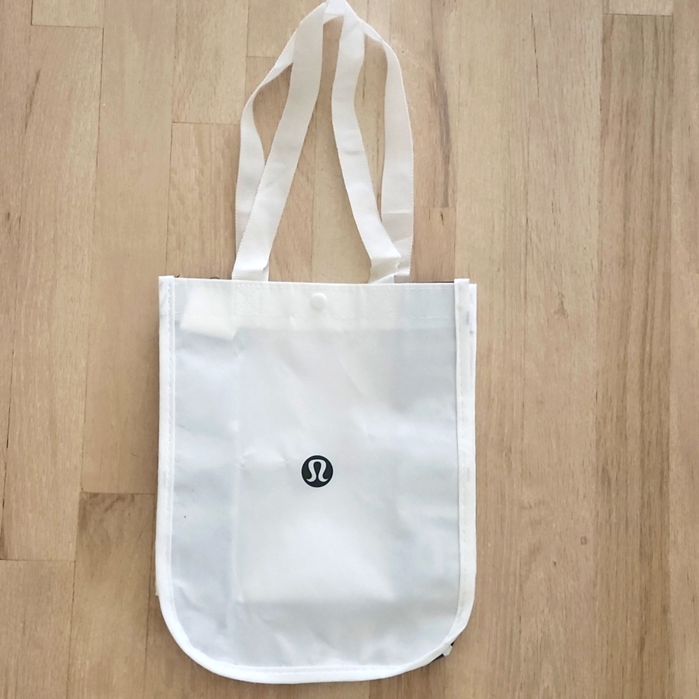 Lululemon Athletica White Small Tote Bag With Fabric Straps And Snap Closure